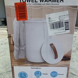 Flyhit towel warmer. Brand new in box, never opened